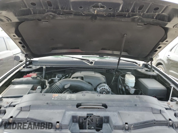 2013 Chevrolet Suburban with VIN 1GNWKMEG4DR257785, listed as a Copart auction lot 76817344 with 68,021 mi miles and Salvage title. Bid and sale history available at DreamBid. Image 12.