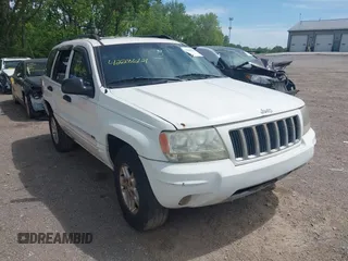 2004 Jeep Grand Cherokee Laredo z VIN 1J4GW48S94C203266, wystawiony jako IAAI lot #42286121 z przebiegiem 252 417 mil mil oraz . Historia ofert i sprzedaży dostępna na DreamBid. Obrazek 1.