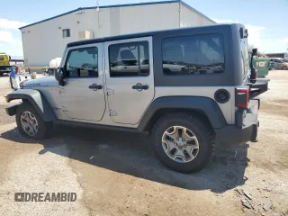 2014 Jeep Wrangler Unlimited Rubicon with VIN 1C4HJWFG1EL241014, listed as a Copart auction lot 63948655 with 165,650 mi miles and Salvage title. Bid and sale history available at DreamBid. Image 2.
