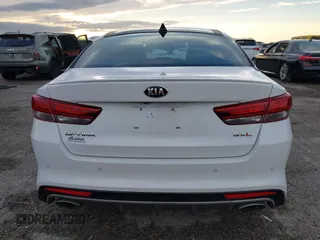 2018 Kia Optima SX z VIN 5XXGV4L21JG182103, wystawiony jako IAAI lot #40522762 z przebiegiem 60 542 mil mil oraz . Historia ofert i sprzedaży dostępna na DreamBid. Obrazek 16.
