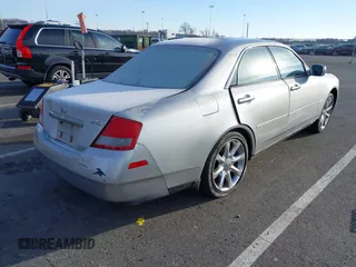 2003 Infiniti M45 with VIN JNKAY41E63M004631, listed as a IAAI auction lot 40966737 with 120,954 mi miles. Bid and sale history available at carsss.com. Image 4.