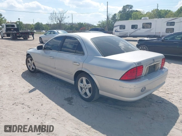 2000 Lincoln LS with VIN 1LNHM87A4YY886613, listed as a IAAI auction lot 41793515 with 144,061 mi miles. Bid and sale history available at carsss.com. Image 3.