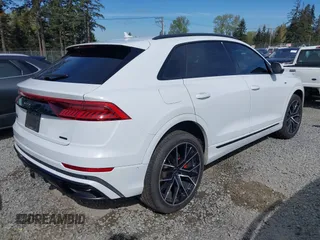 2023 Audi Q8 Premium Plus with VIN WA1EVBF17PD021816, listed as a IAAI auction lot 42024241 with 26,240 mi miles and . Bid and sale history available at DreamBid. Image 4.