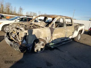 2018 Chevrolet Silverado 1500 LT with VIN 1GCUKREC2JF171317, listed as a Copart auction lot 87939215 with Not Provided miles and Salvage Title. Bid and sale history available at DreamBid. Image 1.