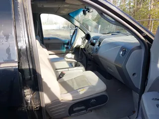 2004 Ford F-150 XLT with VIN 1FTPW14574KC88182, listed as a IAAI auction lot 41864915 with 189,626 mi miles. Bid and sale history available at carsss.com. Image 5.