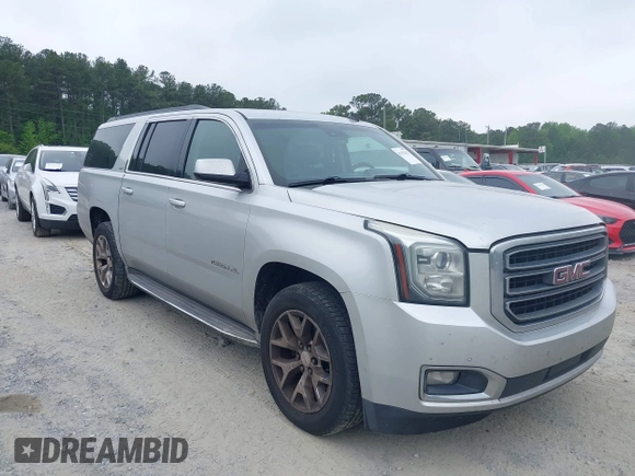 2015 GMC Yukon XL SLT with VIN 1GKS1HKC2FR251672, listed as a IAAI auction lot 42152312 with 232,736 mi miles and . Bid and sale history available at carsss.com. Image 13.