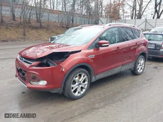 2015 Ford Escape Titanium with VIN 1FMCU9J98FUC90018, listed as a IAAI auction lot 41671941 with 102,335 mi miles. Bid and sale history available at carsss.com. Image 2.