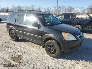 2004 Honda CR-V EX with VIN JHLRD78864C056403, listed as a Copart auction lot 48509515 with 198,718 mi miles and Clean Title. Bid and sale history available at carsss.com. Image 4.
