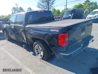 2017 Chevrolet Silverado 1500 LT with VIN 3GCUKREC9HG315955, listed as a IAAI auction lot 41863754 with 235,593 mi miles. Bid and sale history available at carsss.com. Image 3.