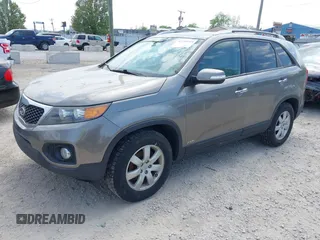 2011 Kia Sorento LX with VIN 5XYKTDA15BG178563, listed as a IAAI auction lot 42259714 with 174,268 mi miles and . Bid and sale history available at DreamBid. Image 2.