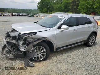 2021 Cadillac XT4 FWD Premium Luxury z VIN 1GYFZCR40MF000293, wystawiony jako Copart lot #58710565 z przebiegiem 49 721 mil mil oraz Szkody całkowita. Historia ofert i sprzedaży dostępna na DreamBid. Obrazek 1.