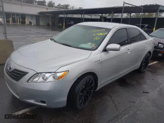 2008 Toyota Camry Hybrid with VIN 4T1BB46KX8U039178, listed as a IAAI auction lot 41868644 with 157,604 mi miles. Bid and sale history available at carsss.com. Image 2.