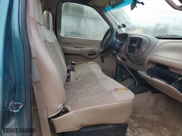 1997 Ford F-150 Standard with VIN 1FTDF1725VKB57712, listed as a Copart auction lot 77773044 with 162,233 mi miles and Salvage Title. Bid and sale history available at carsss.com. Image 10.