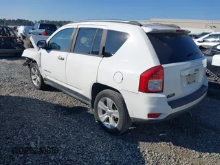 2012 Jeep Compass Latitude with VIN 1C4NJCEA2CD706809, listed as a IAAI auction lot 40956063 with 159,976 mi miles and . Bid and sale history available at carsss.com. Image 3.