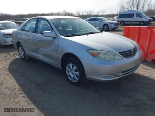 2004 Toyota Camry LE with VIN 4T1BE30K54U828326, listed as a IAAI auction lot 41876818 with 164,876 mi miles. Bid and sale history available at carsss.com. Image 1.