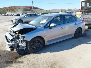 2016 Subaru WRX STI z VIN JF1VA2M66G9801668, wystawiony jako IAAI lot #40666254 z przebiegiem 80 686 mil mil oraz . Historia ofert i sprzedaży dostępna na DreamBid. Obrazek 2.