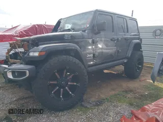 2019 Jeep Wrangler Unlimited Sahara with VIN 1C4HJXEG7KW661801, listed as a IAAI auction lot 40848731 with Not provided miles and . Bid and sale history available at DreamBid. Image 2.