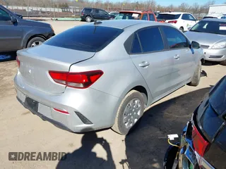 2022 Kia Rio S with VIN 3KPA24AD2NE447421, listed as a IAAI auction lot 41682873 with 52,963 mi miles. Bid and sale history available at carsss.com. Image 4.