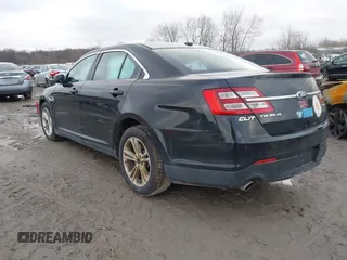 2013 Ford Taurus SEL with VIN 1FAHP2E87DG180296, listed as a IAAI auction lot 42016506 with 137,352 mi miles. Bid and sale history available at carsss.com. Image 3.