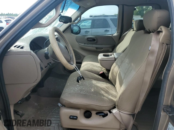 2002 Ford F-150 XL with VIN 1FTRX17L02KC02580, listed as a Copart auction lot 60859595 with 175,892 mi miles and Salvage title. Bid and sale history available at DreamBid. Image 7.