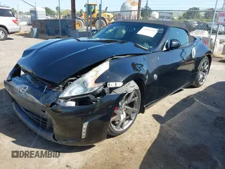 2014 Nissan 370Z Touring with VIN JN1AZ4FH8EM620208, listed as a IAAI auction lot 42094292 with 68,799 mi miles and . Bid and sale history available at DreamBid. Image 17.
