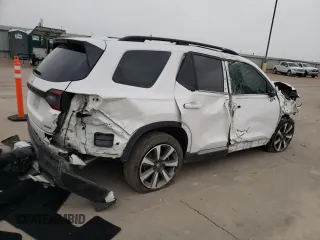 2023 Honda Pilot Elite z VIN 5FNYG1H81PB045653, wystawiony jako Copart lot #51252065 z przebiegiem 57 388 mil mil oraz Szkoda całkowita • Salvage title. Historia ofert i sprzedaży dostępna na DreamBid. Obrazek 3.
