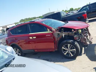 2018 Toyota RAV4 XLE with VIN 2T3WFREV8JW425464, listed as a IAAI auction lot 41977877 with 142,265 mi miles and . Bid and sale history available at carsss.com. Image 13.