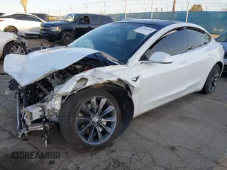 2020 Tesla Model 3 Performance with VIN 5YJ3E1EC1LF602516, listed as a IAAI auction lot 41841216 with 28,967 mi miles and . Bid and sale history available at DreamBid. Image 23.