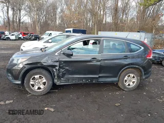 2014 Honda CR-V LX with VIN 2HKRM4H30EH685256, listed as a IAAI auction lot 41429604 with 121,495 mi miles. Bid and sale history available at carsss.com. Image 14.