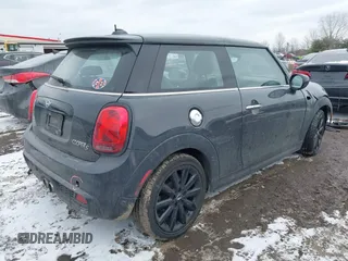 2020 MINI Hardtop Cooper S z VIN WMWXR5C07L2L60692, wystawiony jako IAAI lot #41621462 z przebiegiem 66 898 mil mil oraz . Historia ofert i sprzedaży dostępna na DreamBid. Obrazek 4.