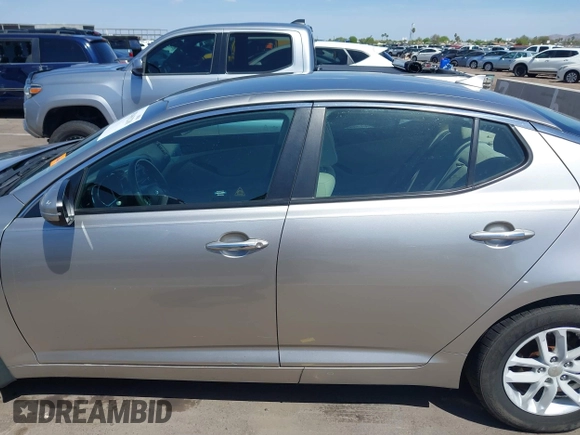 2013 Kia Optima LX with VIN KNAGM4A74D5423255, listed as a IAAI auction lot 42065230 with 116,589 mi miles. Bid and sale history available at carsss.com. Image 14.