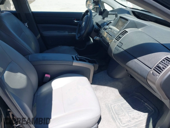 2006 Toyota Prius with VIN JTDKB20U067534309, listed as a IAAI auction lot 42062045 with 149,697 mi miles. Bid and sale history available at carsss.com. Image 5.