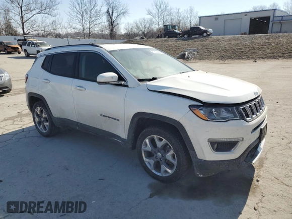 2021 Jeep Compass Limited with VIN 3C4NJDCB4MT556585, listed as a Copart auction lot 47428245 with 99,168 mi miles and Salvage Title. Bid and sale history available at DreamBid. Image 4.
