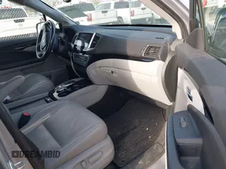 2016 Honda Pilot Touring with VIN 5FNYF6H90GB024902, listed as a IAAI auction lot 41948563 with 148,598 mi miles. Bid and sale history available at carsss.com. Image 5.