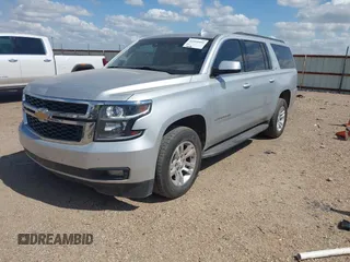 2017 Chevrolet Suburban LT with VIN 1GNSCHKC9HR287701, listed as a IAAI auction lot 42510491 with 166,568 mi miles and . Bid and sale history available at DreamBid. Image 17.