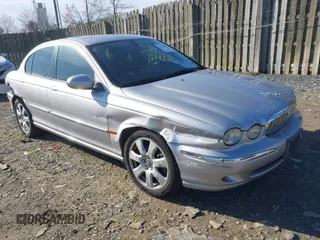 2004 Jaguar X-Type with VIN SAJEA51C94WD62540, listed as a IAAI auction lot 41864020 with 85,713 mi miles. Bid and sale history available at carsss.com. Image 1.