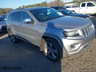 2014 Jeep Grand Cherokee Overland with VIN 1C4RJFCGXEC162238, listed as a IAAI auction lot 41291512 with 88,261 mi miles. Bid and sale history available at carsss.com. Image 1.