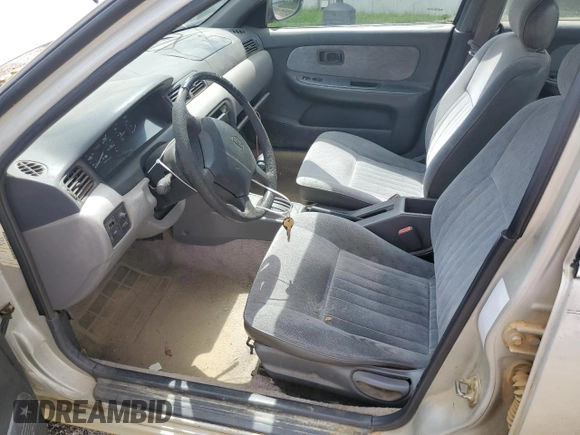 1996 Nissan Sentra XE z VIN 3N1AB41DXTL004753, wystawiony jako Copart lot #47585125 z przebiegiem 239 957 mil mil oraz Szkoda całkowita • Salvage title. Historia ofert i sprzedaży dostępna na DreamBid. Obrazek 7.
