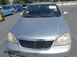 2006 Suzuki Forenza z VIN KL5JD86Z06K325179, wystawiony jako IAAI lot #42507357 z przebiegiem Nie podano mil oraz . Historia ofert i sprzedaży dostępna na DreamBid. Obrazek 10.