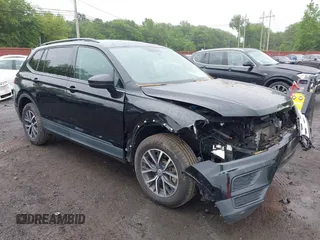 2021 Volkswagen Tiguan S z VIN 3VV0B7AX3MM031908, wystawiony jako IAAI lot #42504384 z przebiegiem 42 510 mil mil oraz . Historia ofert i sprzedaży dostępna na DreamBid. Obrazek 6.