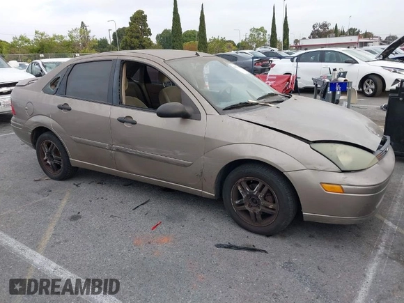 2003 Ford Focus SE z VIN 1FAFP34Z73W236474, wystawiony jako IAAI lot #39378102 z przebiegiem 183 280 mil mil oraz . Historia ofert i sprzedaży dostępna na DreamBid. Obrazek 1.