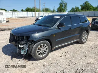 2014 Jeep Grand Cherokee Summit с VIN 1C4RJFJT7EC106385, выставлен на аукционе Copart как лот 52420665 с пробегом 122 830 миль миль и Списание • Salvage title. История ставок и продаж доступна на DreamBid. Изображение 1.