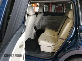 2023 Volkswagen Atlas SE z VIN 1V2HR2CA5PC527628, wystawiony jako IAAI lot #42569146 z przebiegiem 27 424 mil mil oraz . Historia ofert i sprzedaży dostępna na DreamBid. Obrazek 9.