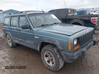 1997 Jeep Cherokee Sport with VIN 1J4FJ68S9VL607515, listed as a IAAI auction lot 41216502 with 238,274 mi miles. Bid and sale history available at carsss.com. Image 1.