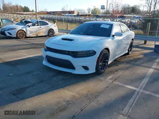 2020 Dodge Charger Scat Pack Widebody with VIN 2C3CDXGJ3LH244092, listed as a IAAI auction lot 41828294 with 107,568 mi miles. Bid and sale history available at carsss.com. Image 18.