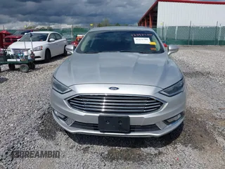 2017 Ford Fusion Titanium with VIN 3FA6P0K99HR112234, listed as a IAAI auction lot 42332700 with 106,685 mi miles and . Bid and sale history available at DreamBid. Image 12.