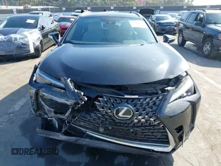 2024 Lexus UX with VIN JTHX6JBH7R2162231, listed as a IAAI auction lot 41665179 with 21,913 mi miles. Bid and sale history available at carsss.com. Image 13.