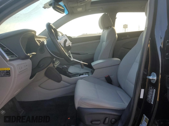 2017 Hyundai Tucson Sport with VIN KM8J3CA25HU572940, listed as a Copart auction lot 87414304 with 56,854 mi miles and Salvage Title. Bid and sale history available at DreamBid. Image 7.