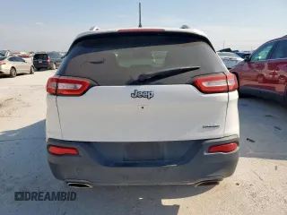 2016 Jeep Cherokee Latitude with VIN 1C4PJLCS2GW114244, listed as a Copart auction lot 53095715 with 108,054 mi miles and Salvage Title. Bid and sale history available at carsss.com. Image 6.