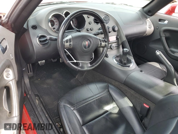 2008 Pontiac Solstice z VIN 1G2MB35B88Y107998, wystawiony jako Copart lot #49872315 z przebiegiem 70 788 mil mil oraz Czysty tytuł • Clean title. Historia ofert i sprzedaży dostępna na DreamBid. Obrazek 8.